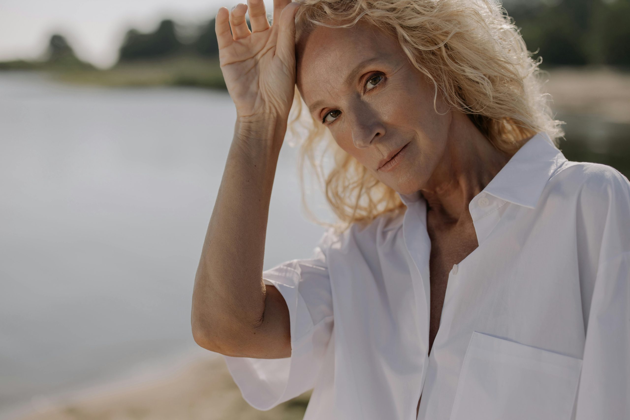 blonde middle aged model with fresh face after anti aging treatments